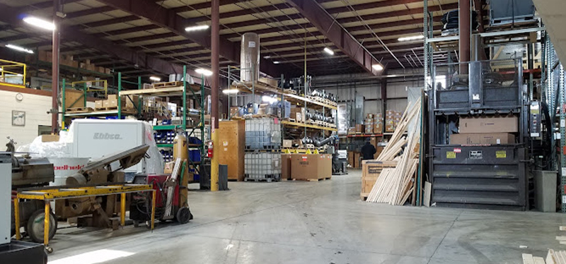 Ebbco Inc factory floor showcasing industrial filtration systems, equipment, and organized storage for manufacturing operations.