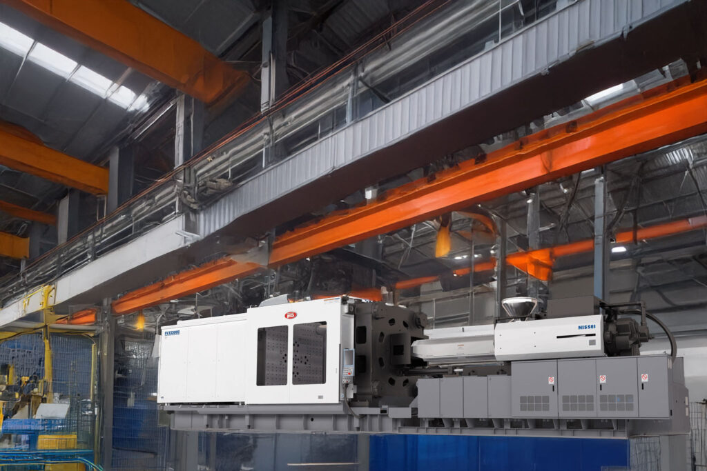 large Nissei industrial machine in a spacious factory with high ceilings and bright orange overhead cranes. The factory is well-lit and organized, emphasizing heavy machinery and industrial operations.